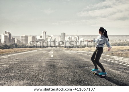 Girl ride skateboard