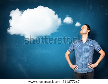 Man standing and dreaming with a sky above his head