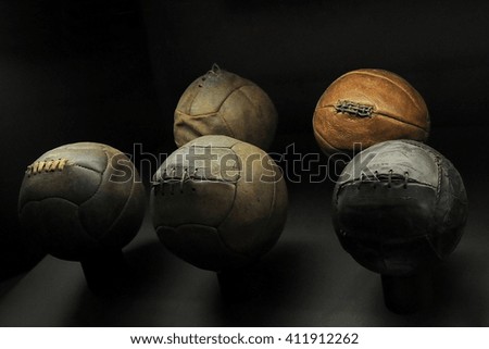 Old football ball Royalty-Free Stock Photo #411912262