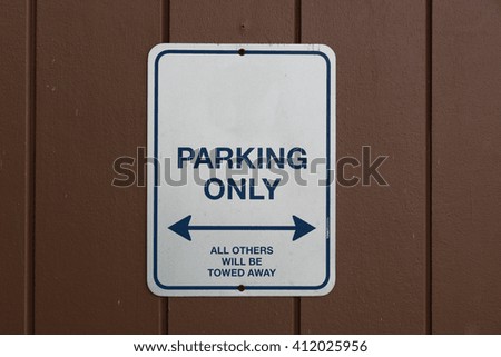 Sign parking only