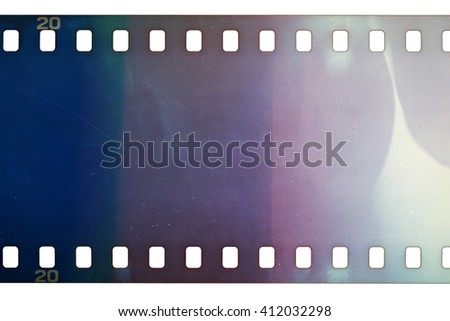 Blank grainy film strip texture background with lots of dust, noise and light leak isolated on white