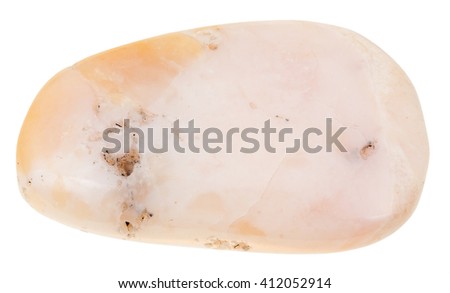 macro shooting of natural mineral stone - polished pink opal gemstone from Peru isolated on white background