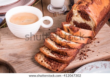 Chocolate and Vanilla Gluten free Marble Cake, made in a loaf pan served with coffee. Homemade  Pound Cake.