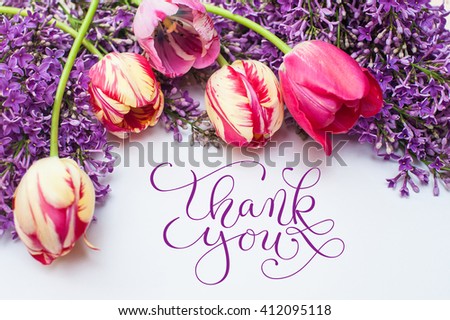 frame from tulips and lilac  with words thank you