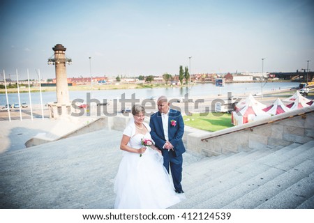 an image of the groom and the bride walk on the ancient city