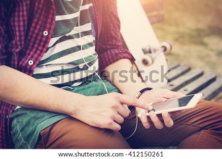 Skateboarding Sitting Relaxation Park Holiday Concept