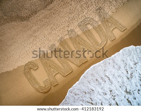 Canada written on the beach