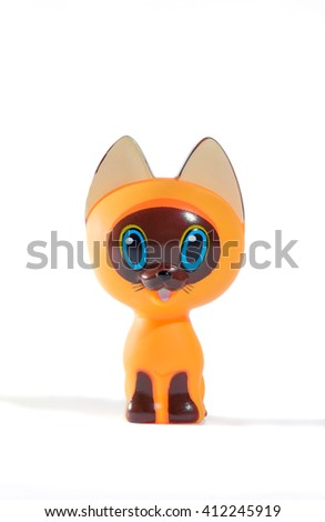Children rubber toy cat Woof on a white background