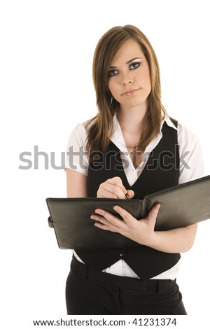 Young business lady writing in a folder. Studio with isolated white background.