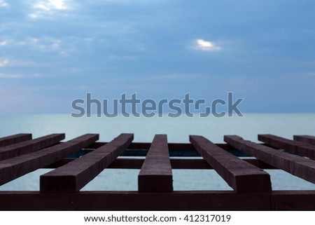 Picture can be used as a background. red board with a beautiful backdrop of the sea. Marine background for your desktop. red dirty wooden space and sea. Sevastopol