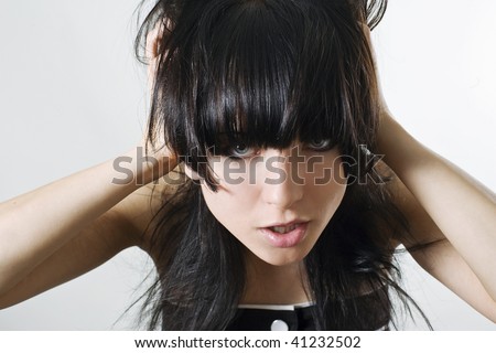 Beautiful black haired emo girl closeup portrait