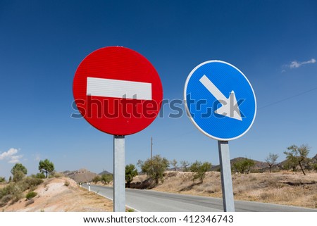 No entry and Pass this side signs