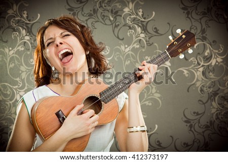 vintage woman plays ukulele and sing on tapestry background