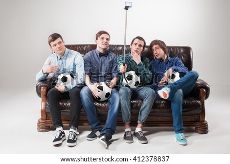 The four guys with balls on gray background