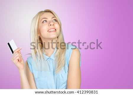 Young cool woman with credit card