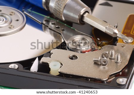 diagnostic and repair magnetic computer hard disk, mass memory on white background