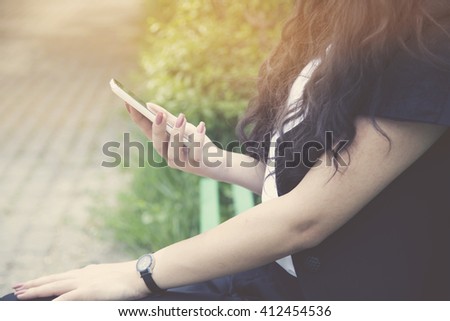 Business woman use of mobile phone