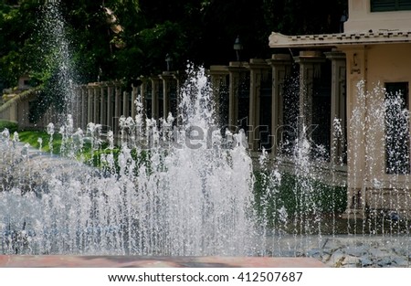 fountain in garden.water of a fountain.water stream splashing.water spring. 