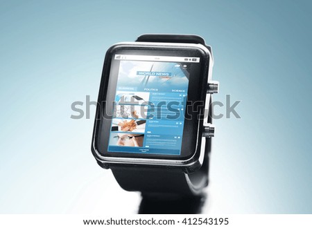 modern technology, mass media, application and object concept - close up of black smart watch with news web page on screen over blue background