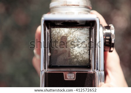 Shooting girl's portrait with old medium format camera.