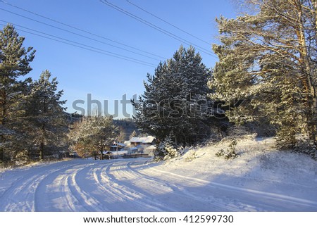 Winter landscape, Road in Russian village, Snow.