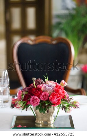 bouquet of red and pink roses and tulips