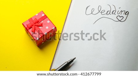 wedding notebook with wedding ring
