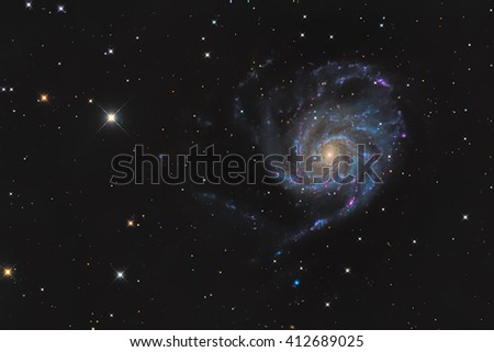Messier 101 or Pinwheel galaxy in the constellation Ursa Major taken with CCD camera and medium focal length telescope