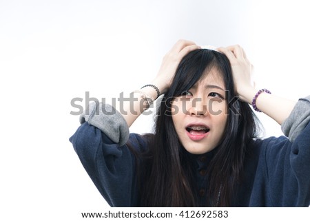 Asian woman thinking on white background