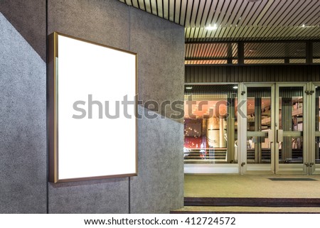 Photo blank mockup of event poster lightbox  glowing on concrete wall at night