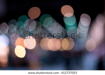 A background of light bulb with soft blur light form a beautiful bokeh. Picture was shot in the night. Creamy and romantic