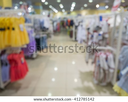 Abstract blurred of kids wear of department store background with bokhe