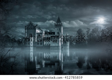 Mystic Water castle in moonlight Royalty-Free Stock Photo #412785859