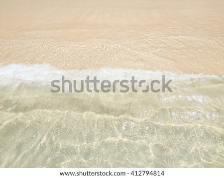 Nature Wave of the sea on the sand beach background