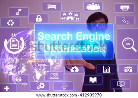 Search Engine Optimization  (SEO) concept  presented by  businessman touching on  virtual  screen ,image element furnished by NASA