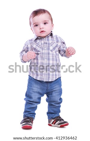 Portrait of beautiful little boy in Studio on white background