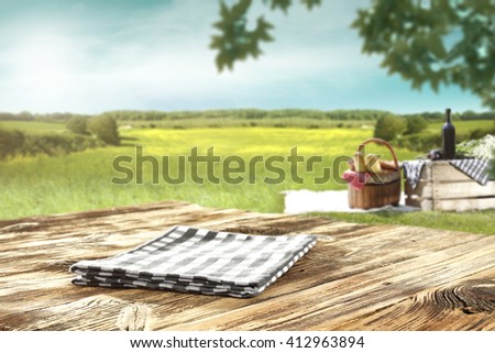 rural landscape and shabby desk and napkin place 