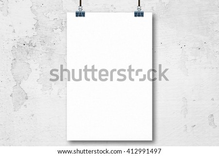 Hanging blank poster on old concrete wall background for product presentation.