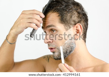 Man is grooming and beautifying oneself