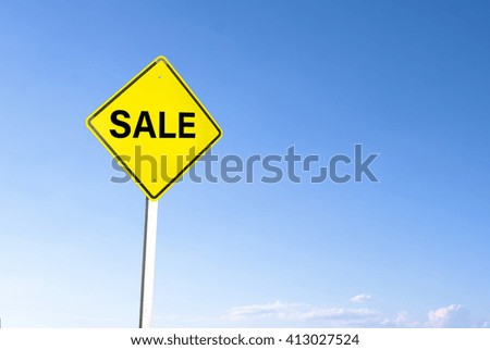Sale road sign on blue sky background.