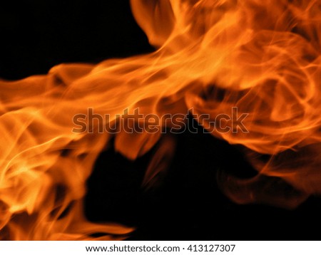 Texture fire flames on a black background