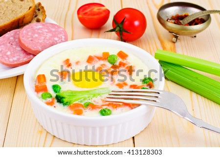 Healthy and Diet Food: Scrambled Eggs with Vegetables. Studio Photo