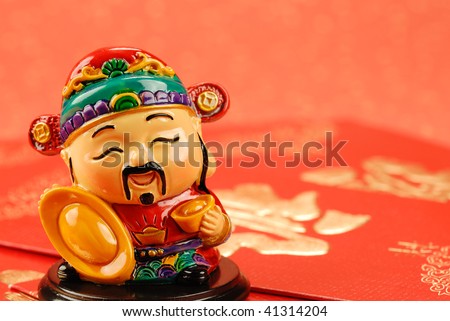 Chinese new year decoration--Chinese traditional mammon figure  for celebration of the lunar new year. Royalty-Free Stock Photo #41314204