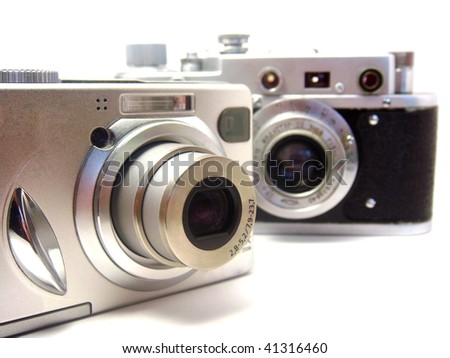 New and old cameras over white
