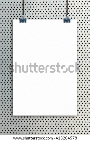 Hanging blank poster on iron plate background.