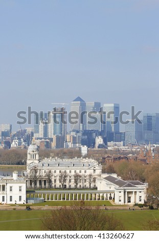 London Skyline seen from Greenwich Park. Overlooking Canary Wharf with Maritime Museum. 

