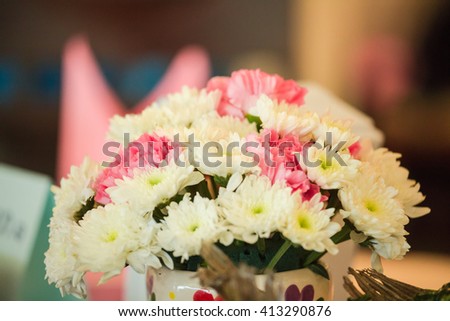Sweet flower vase on dinner table
