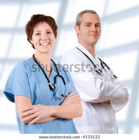 happy male doctor in lab coat on white Royalty-Free Stock Photo #4133122