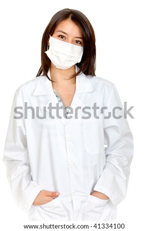 Female doctor with a facemask isolated over a white background
