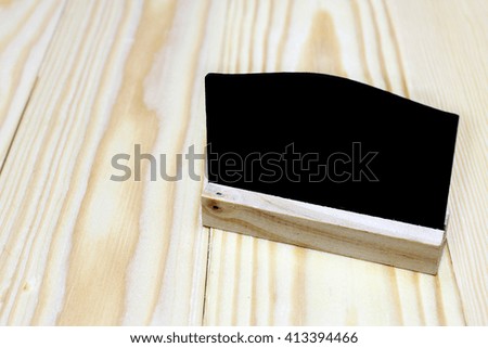board on wood background